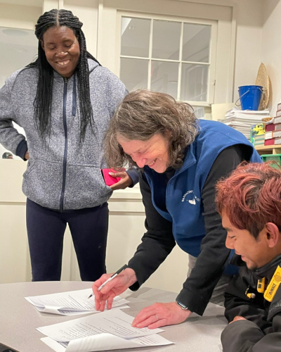 Community volunteers and church partners at The Warming Place as they launch an overnight shelter in Nantucket to support people experiencing homelessness.